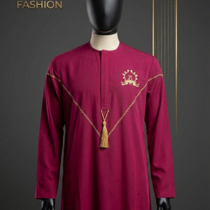 A regal wine Jalab distinguished by a V-shaped golden laurel embroidery, an intricate chest crest, and a handcrafted gold tassel.