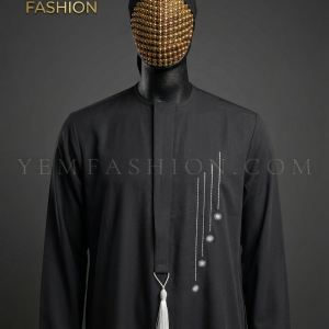 The Black Kandura: An elegant, matte black piece featuring contrasting white vertical lines and celestial star embroidery, finished with a crisp white placket tassel.